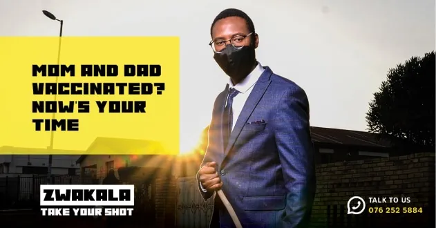 A man in a suit and face mask, beside the words “Mom and dad vaccinated? Now’s your time”